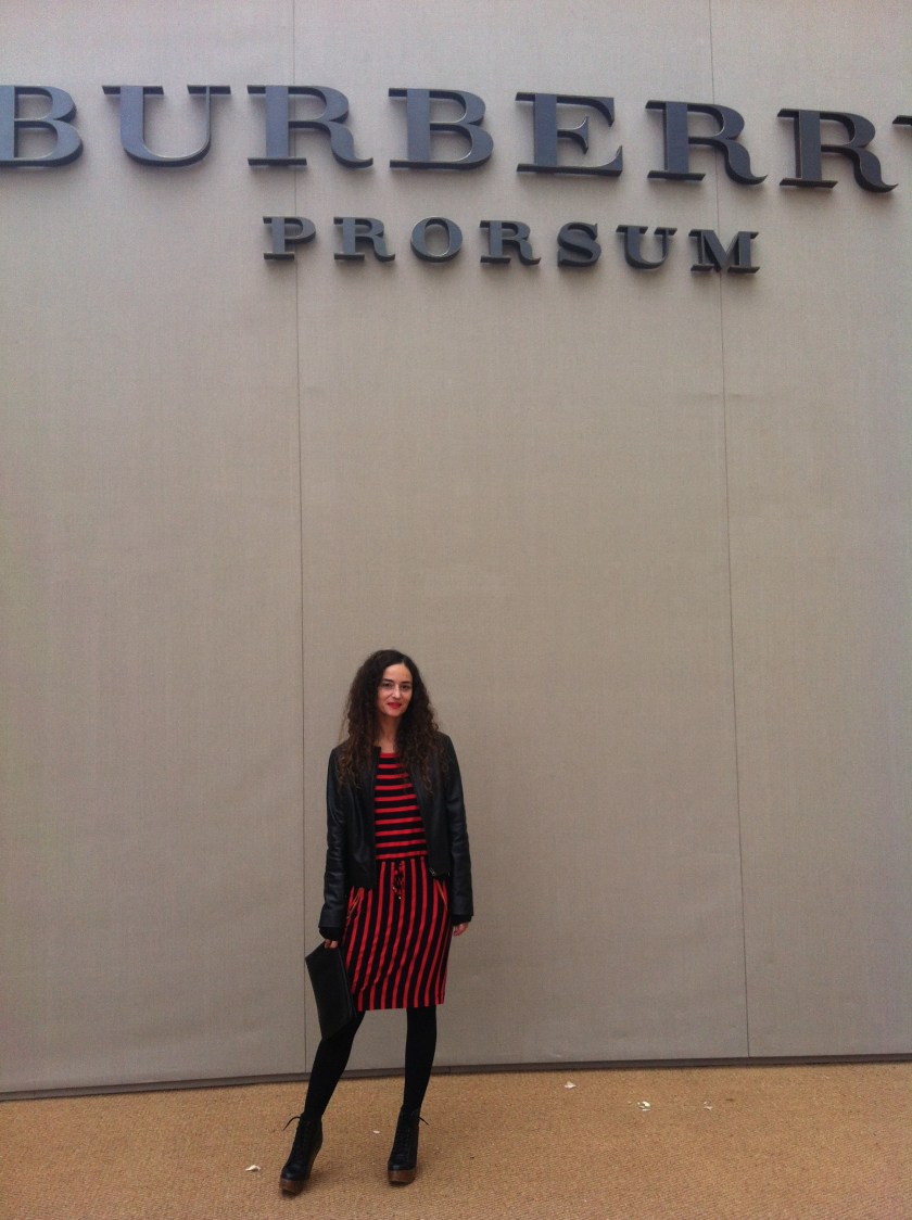 muymia before the Burberry Prorsum SS14 catwalk show in Kensignton Gardens wearing Calvin Klein dress, Soler leather jacket and Jeffrey Campbell leather boots